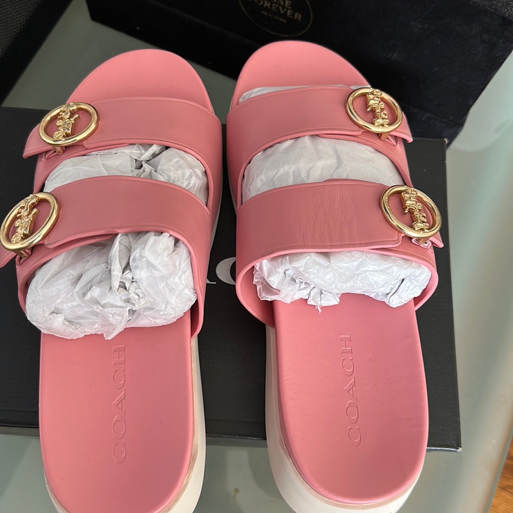 Very comfortable pink women’s coach slippers